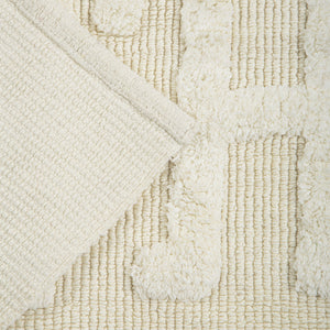 Tapete de algodão decorativo no tamanho 50x80 cm confeccionado em puro algodão com texturas e relevos em técnica tufting com costuras e acabamentos reforçados nas bordas, perfeito para delimitar espaços com muito charme e proporcionar conforto térmico ao caminhar.
